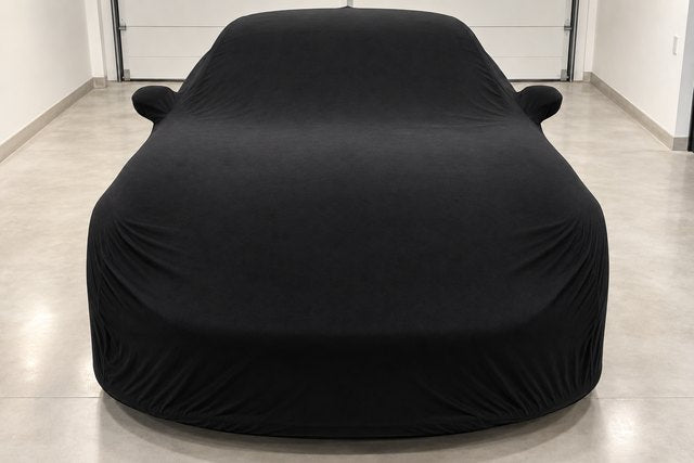 Indoor cover on a car in a garage